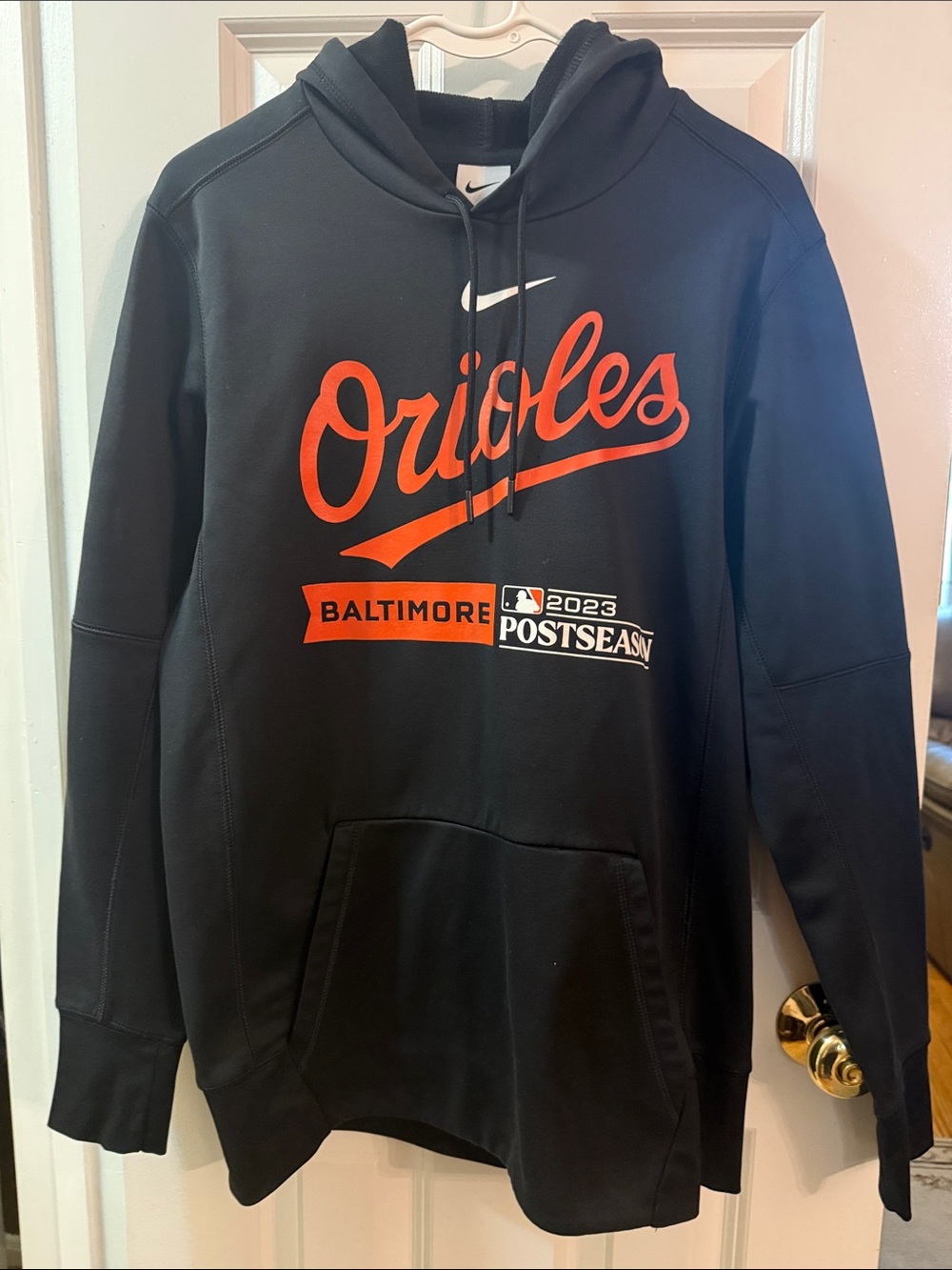 Nike Black Pullover Hoodie with Orange Orioles Script